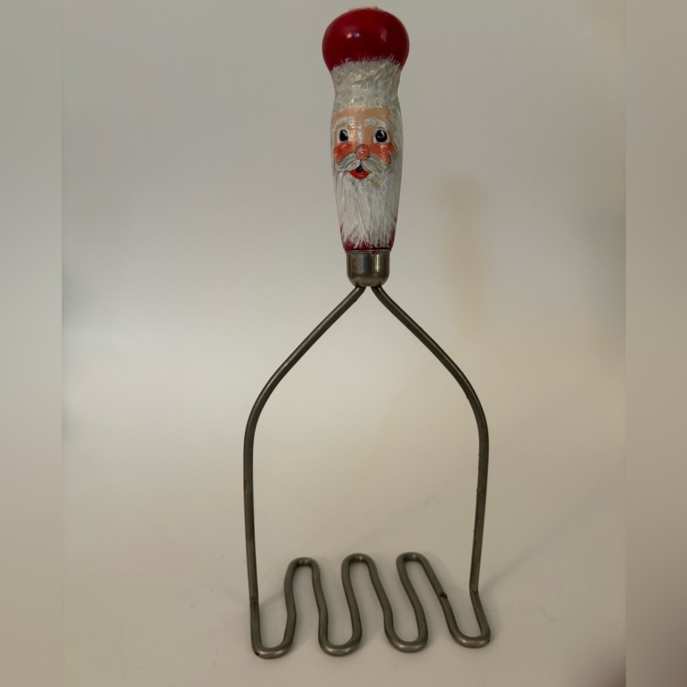 Santa-Themed Vintage Metal Potato Masher